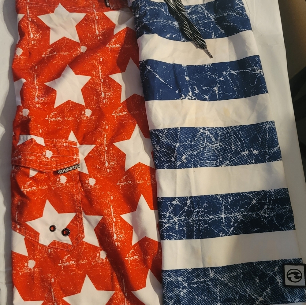 Mens size 34 Ocean Current red/white/blue swim shirts. Comfortable